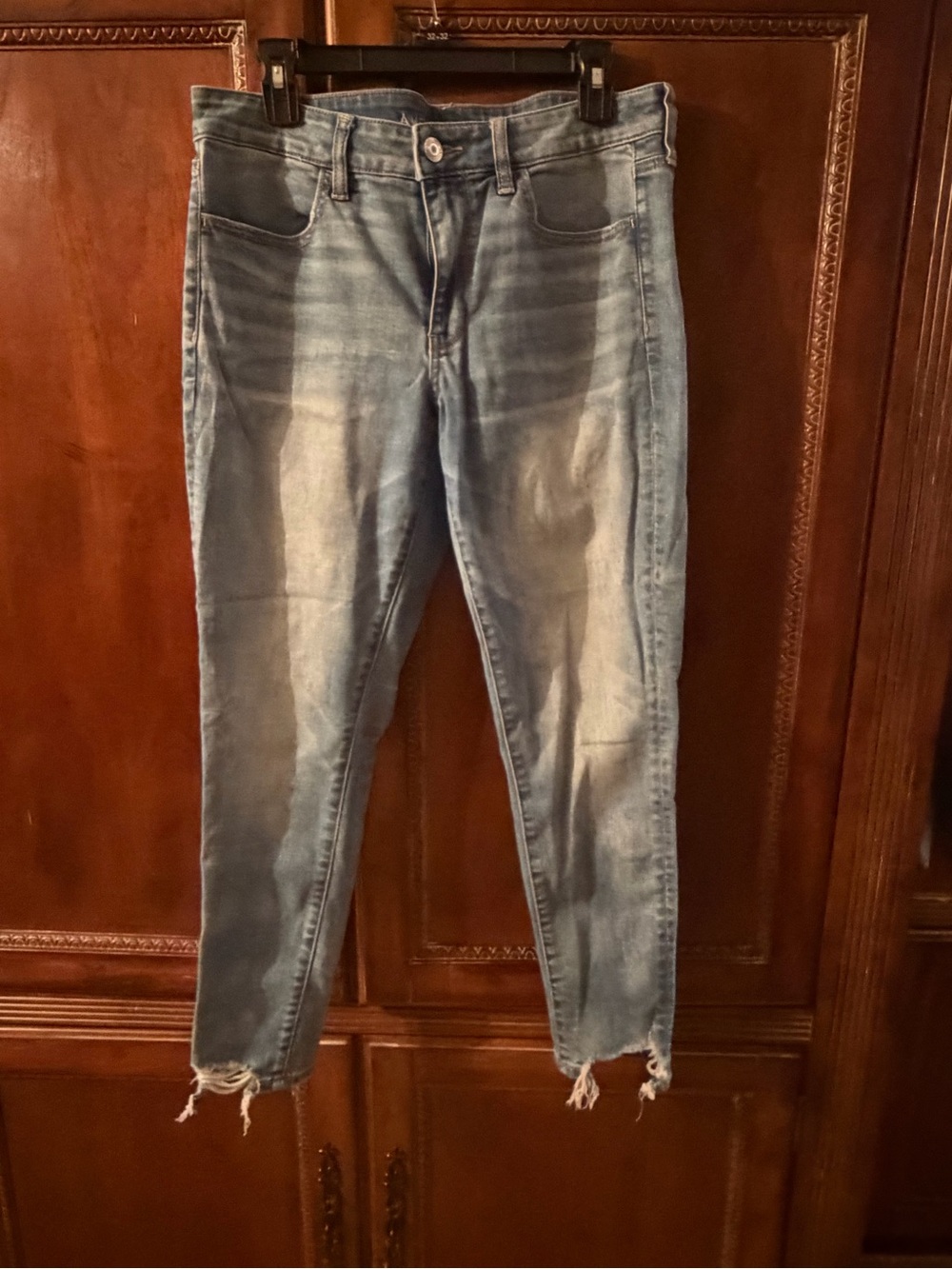 America Eagle Light Wash Frayed Hem Skinny Jeans